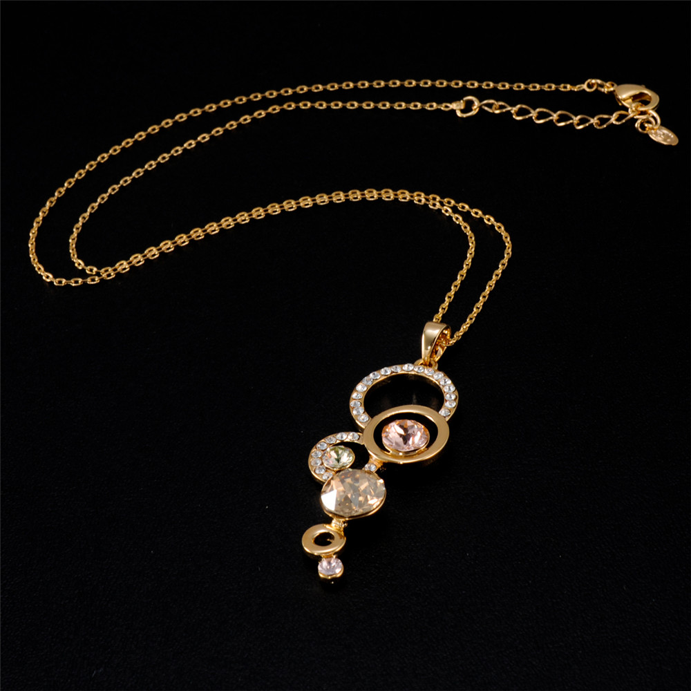 Gold and Zircon Multi-Ring Connected Crystal Pendant Necklace